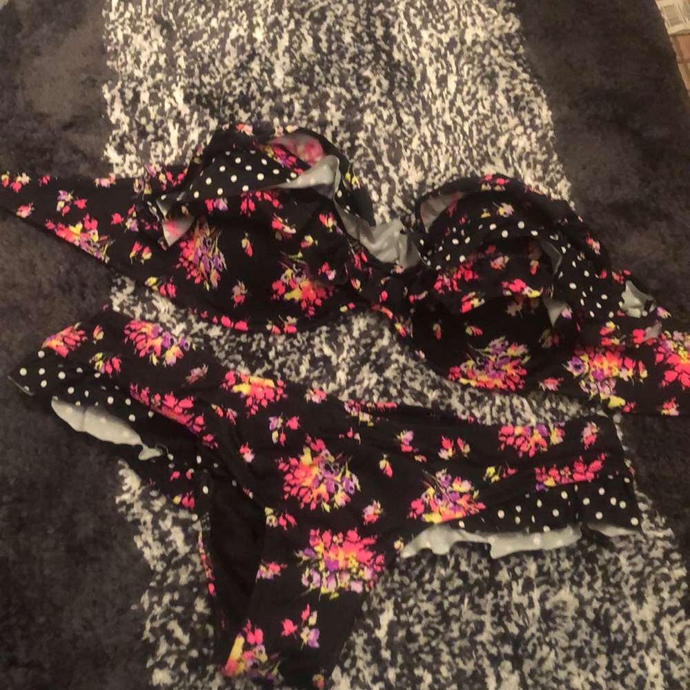 Victoria Secret black floral ruffle swimsuit.